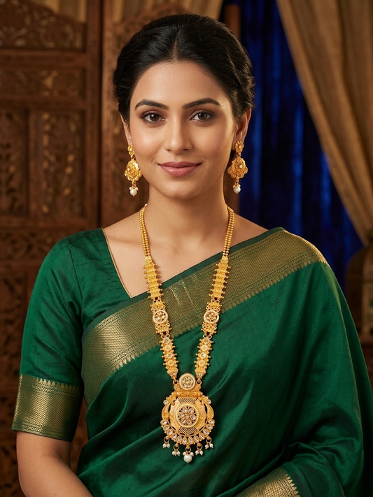 Traditional Gold Temple Jewelry Set: Long Haram Necklace and Matching Jhumka Earrings with  Stone Accents and Pearl Drops